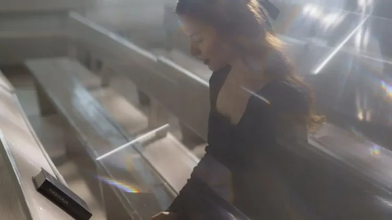 Woman reflecting alone in a church pew on how to forgive according to the Bible