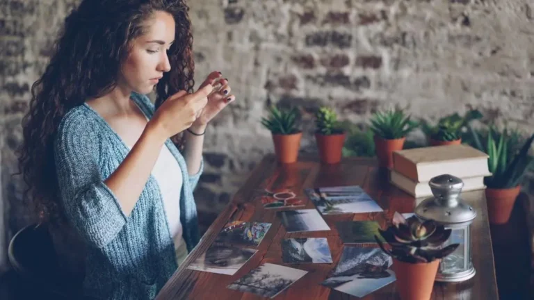 Woman reviewing photos and reflecting on how to know if you have forgiven someone